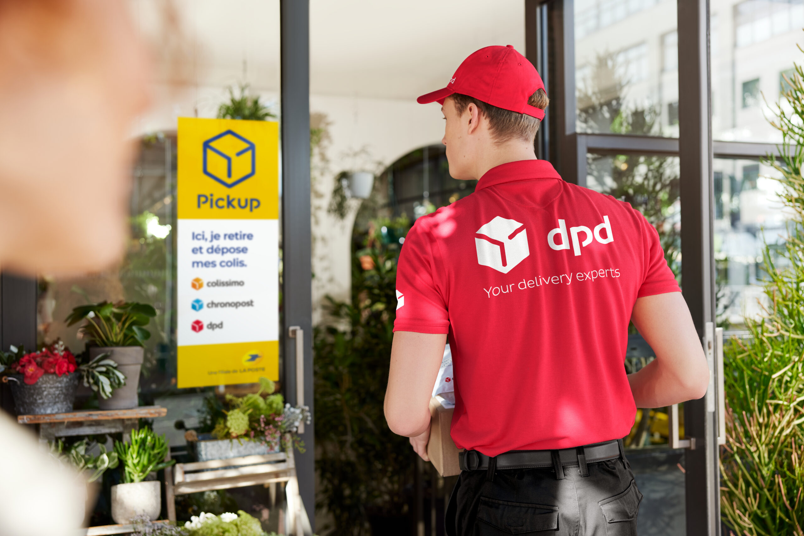 dpd driver entering Pickup parcelshop