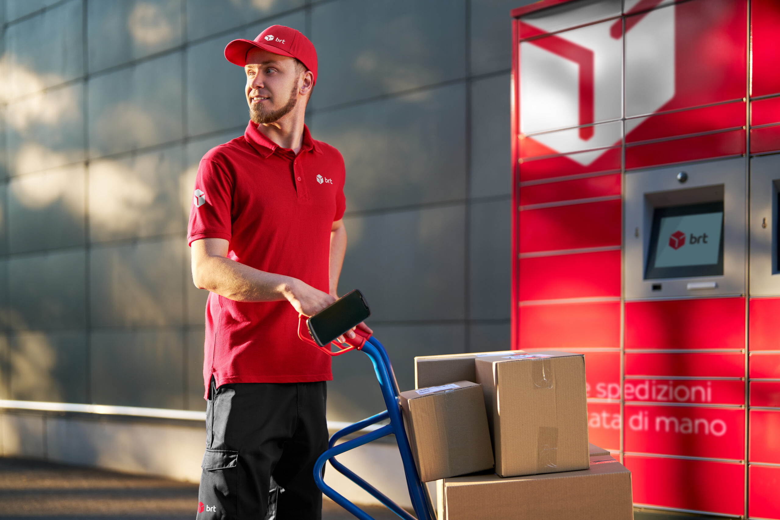 Driver delivering parcels to locker
